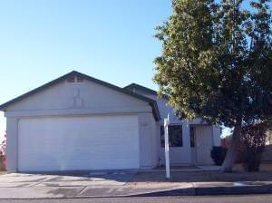 4640 N. 86th Ave. Own this foreclosed home with NO MONEY DOWN!
